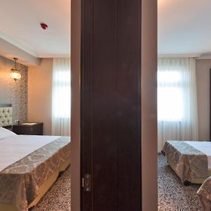 Familie Kamer met een King Size Bed